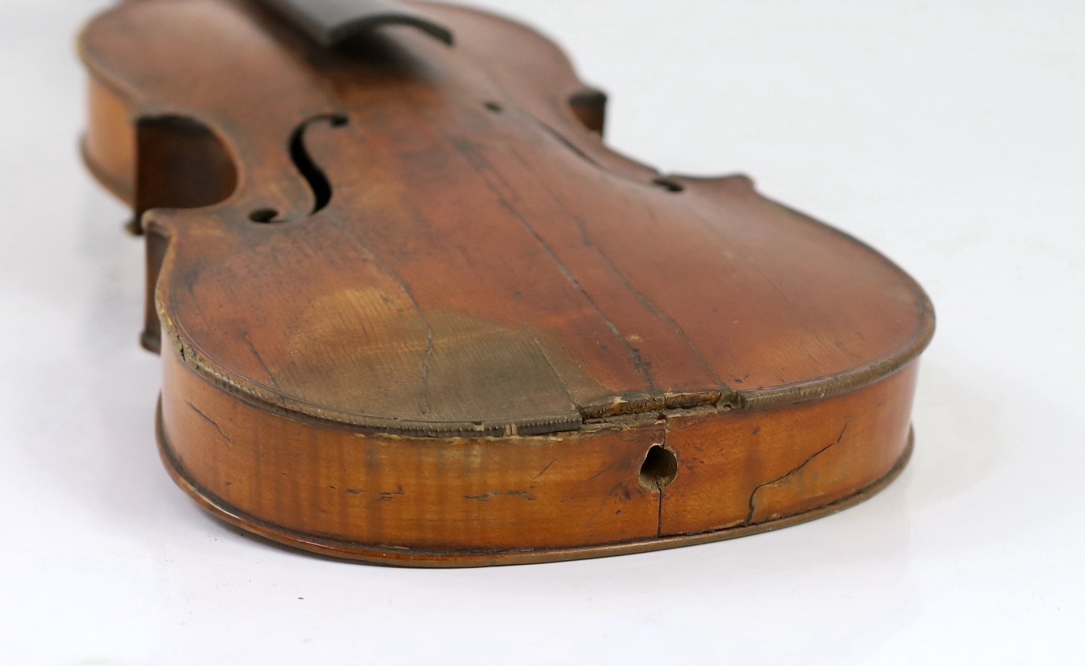 A 19th century French single back violin, length of back 36.2cm